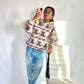 Pull en laine épaisse avec capuche et motif