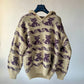 Pull en laine épaisse avec capuche et motif