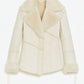 Manteau blanc en fourrure