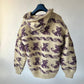 Pull en laine épaisse avec capuche et motif
